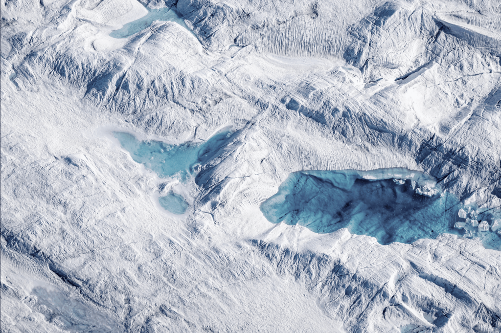 Aerial view of Kaskawulsh Glacier, snowy mountains with two blue lakes