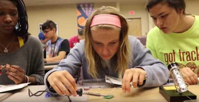 three female SMART students work together to create a sensor