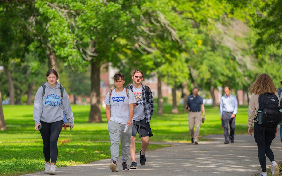 A photo of students walking through the mall