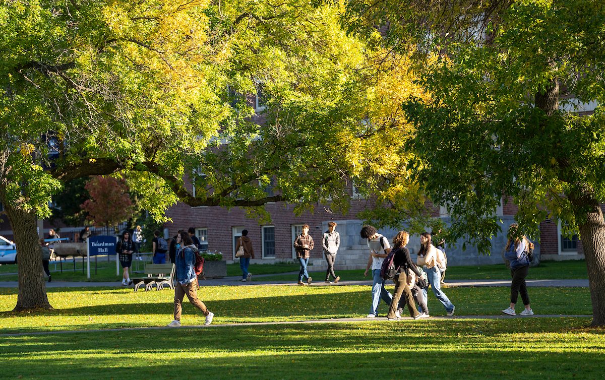 A photo of students walking through the mall