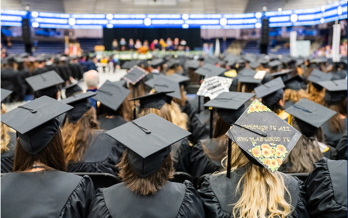 A photo of graduate students at commencement