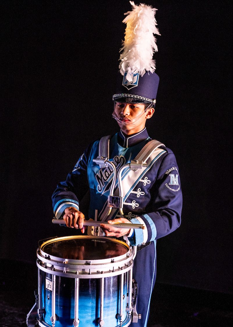 A photo of a Maine Marching Band member