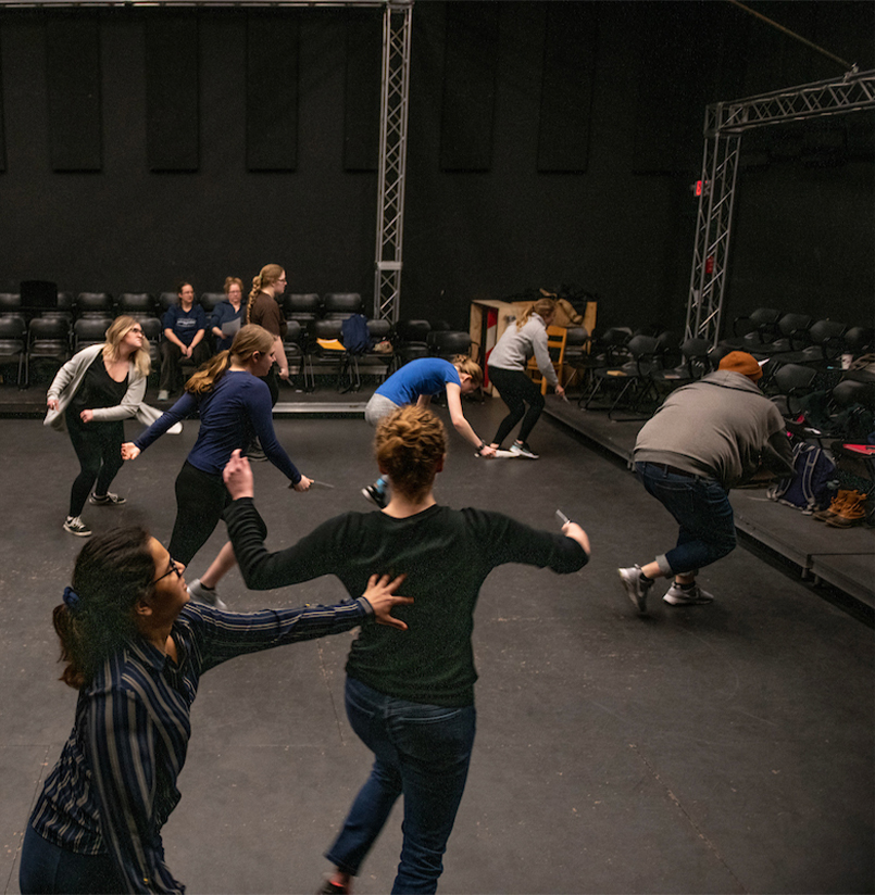 A photo of a fight practice in the Black Box Theatre
