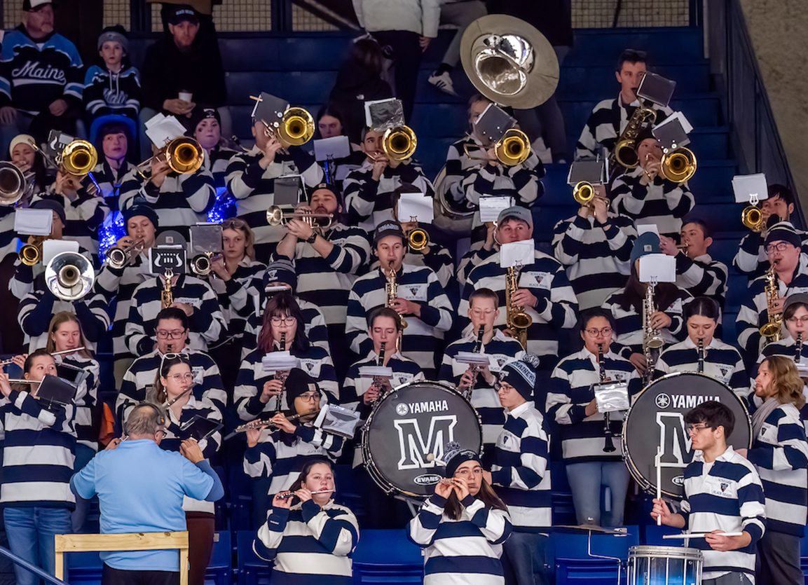 A photo of the UMaine pep band during a hockey game