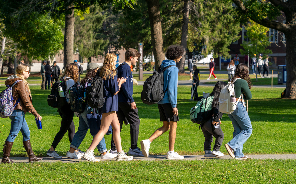 A photo of students walking through campus