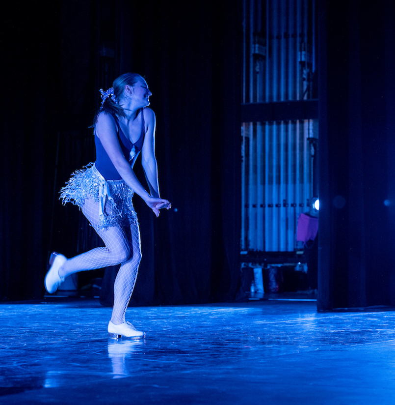 A photo of a student in a tap performance