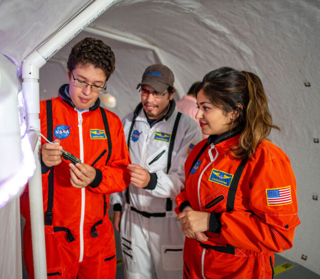 researchers in the lunar habitat