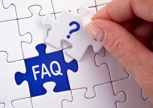 Puzzle piece with a question on it being put in the last open spot on a puzzle with "FAQ" in it