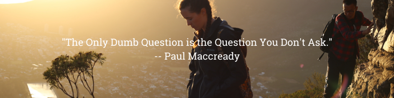 Banner of a girl in the sunrise on mountain with text that says "The only dumb question is the question you don't ask" by Paul Mccready