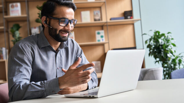Happy indian business man remote teacher,