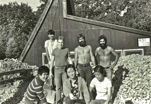 Historical image of students installing the rock bed for passive solar heat storage