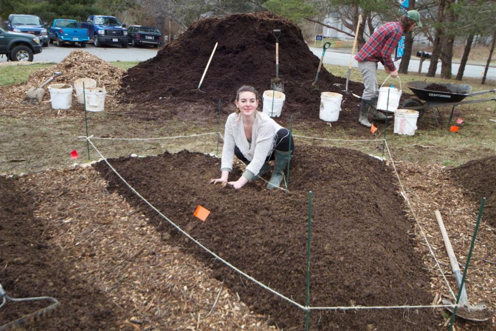 woman working on permaculture plots at Terrell House