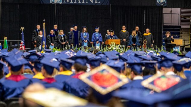 Banner for Governance section showing President Ferrini-Mundy speaking at graduation.