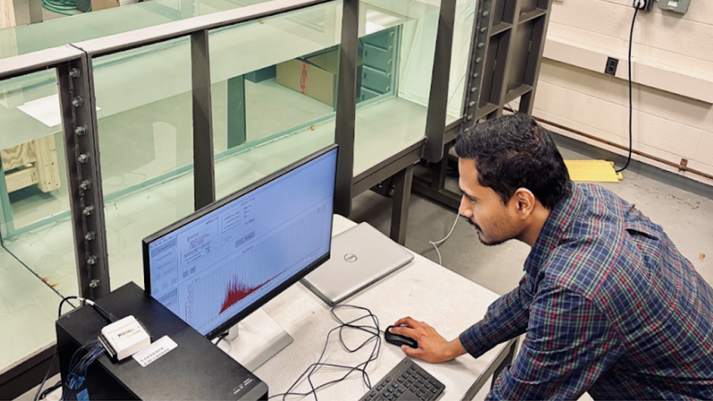 A photo of a student working in a lab