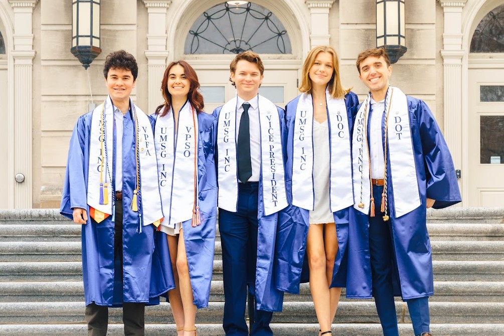 UMSGs 2025 Graduating Executives standing in front of Fogler Library.