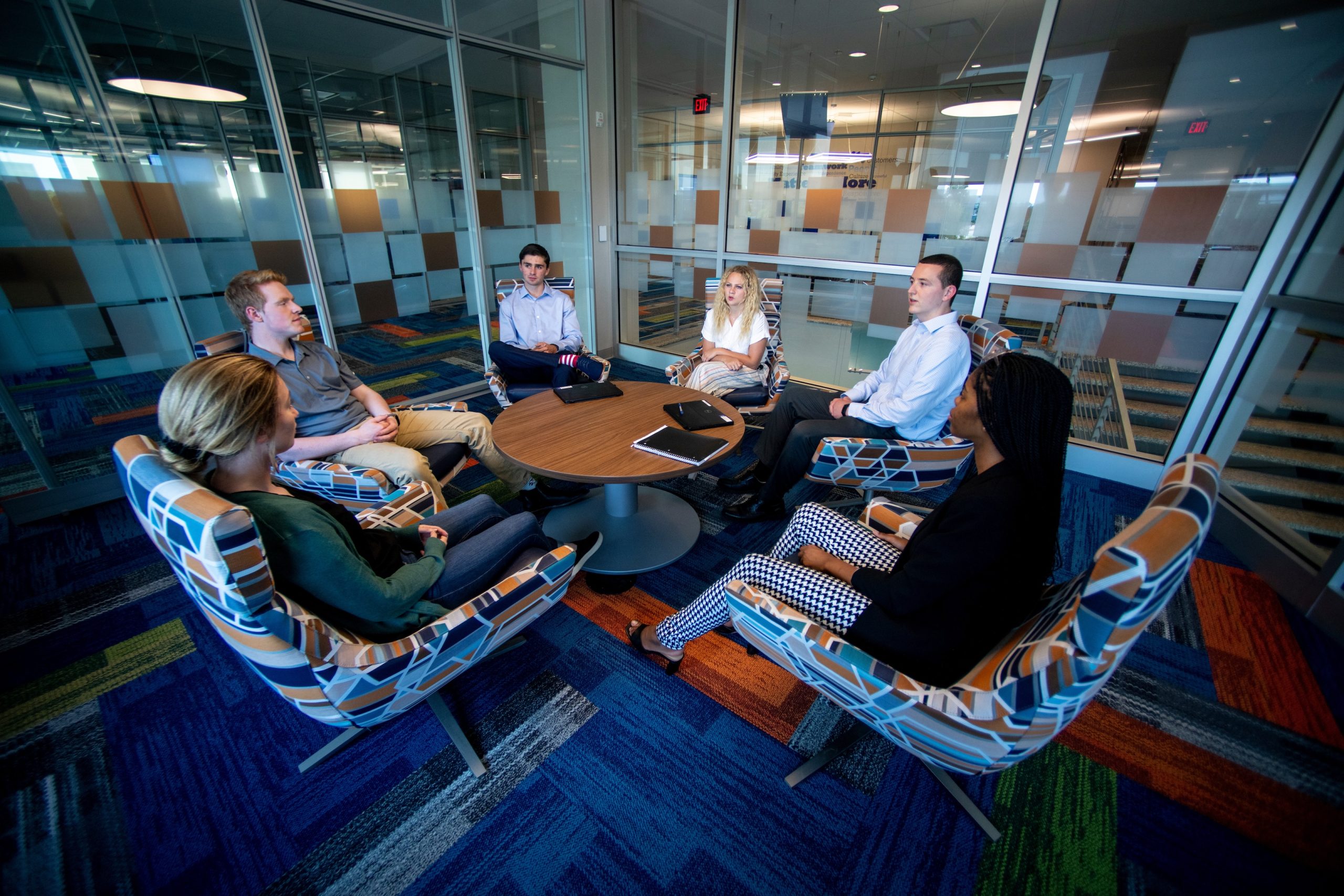 Group of people in a meeting in a conference room