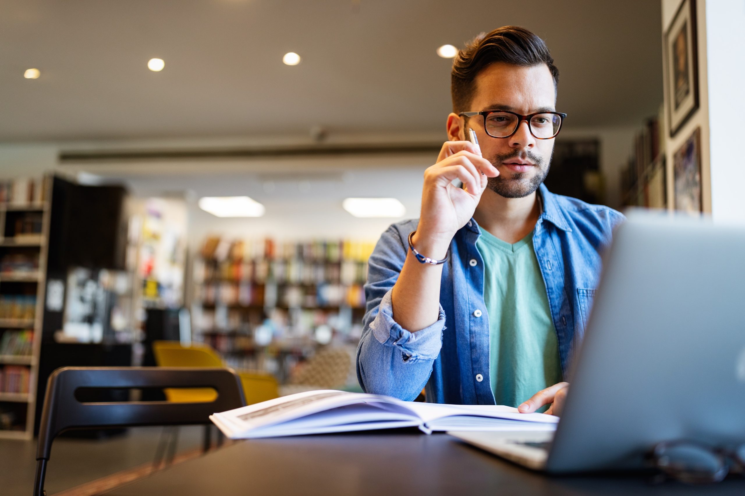 Student on a laptop in a library