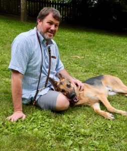 Nick with his guide dog, Norbert