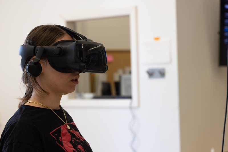 A female student in a VR headset