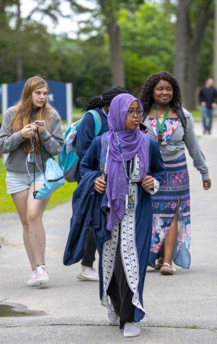 Group of students walking on campus