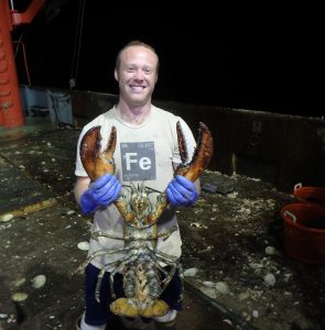 Carl holding a giant lobster