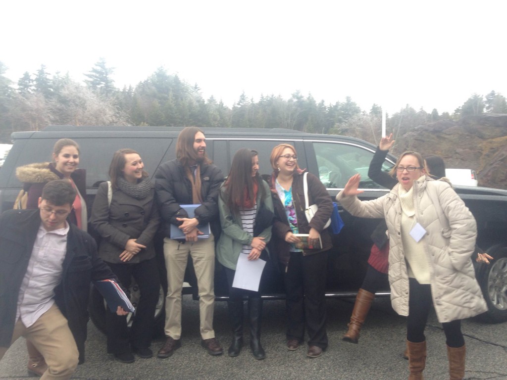 Chris Sargent, Sarah LeFave, Maddie Kelly, Jimmy Ozog, Alex Mooney, Morgan Jewett Kent, and Paige Mitchell goofing around in a parking lot