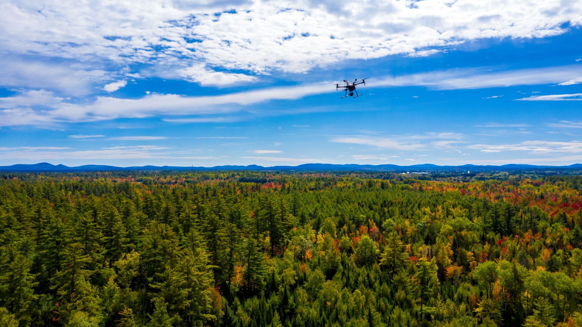 High-oblique aerial photo of UMaine Demeritt Forest with UAV