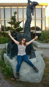 Meija in front of the bear statue