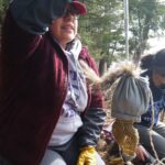 Student weighing squirrel