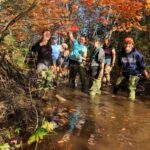 Students working in water