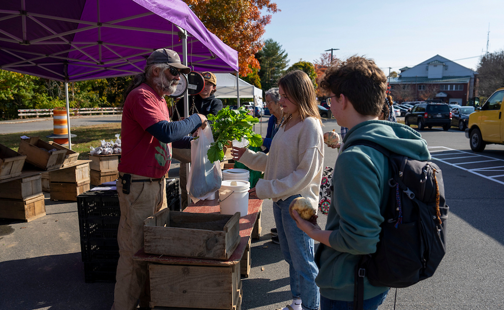 A photo of students at the Orono farmers market