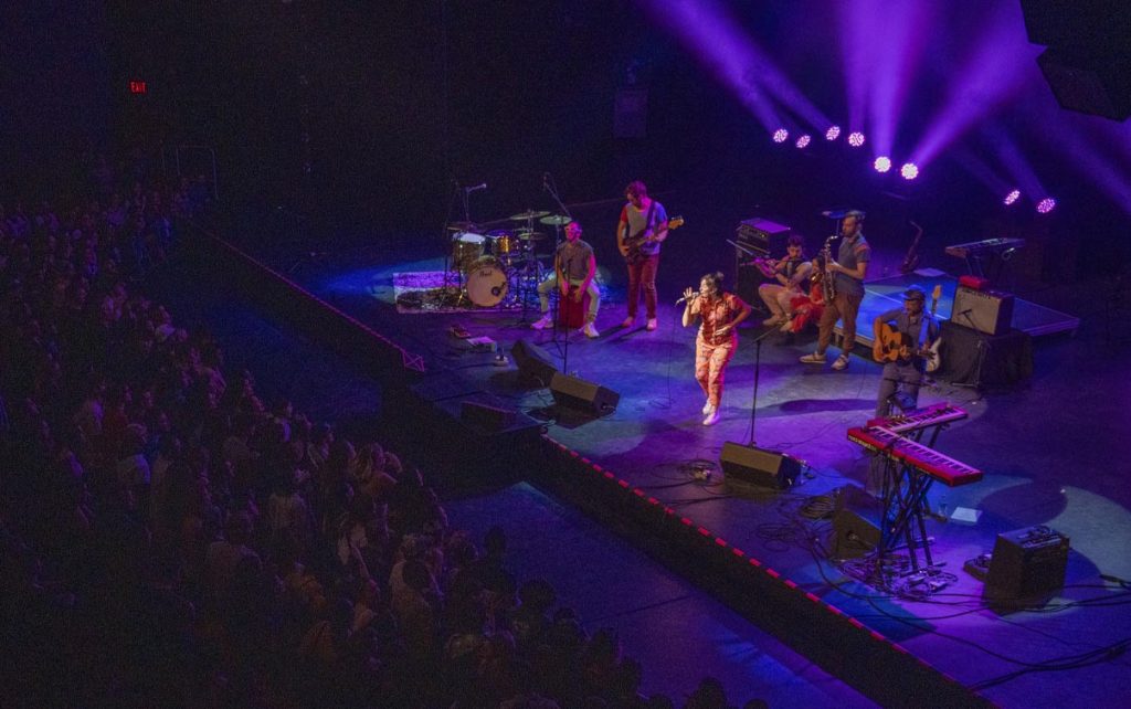 A photo of singers on stage
