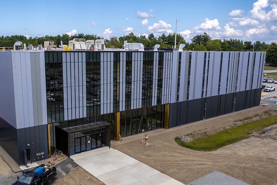 A photo of the new GEM building nearing the end of construction.
