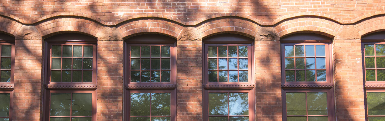 Windows in the side of a brick building