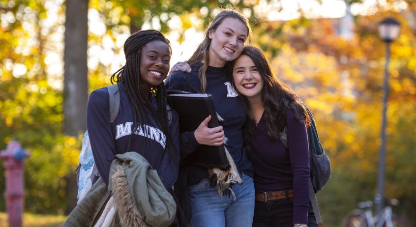 UMaine students walking on campus