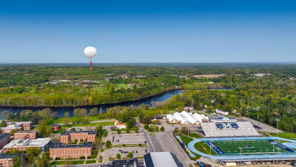 A photo of a high altitude balloon over UMaine's campus