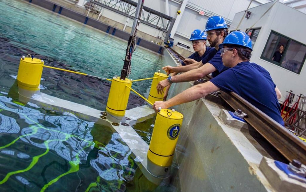 A photo of researchers at the wave tank in the ASCC