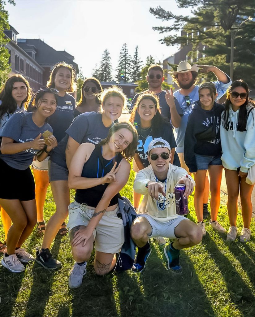 A photo of a group of people posing for the camera