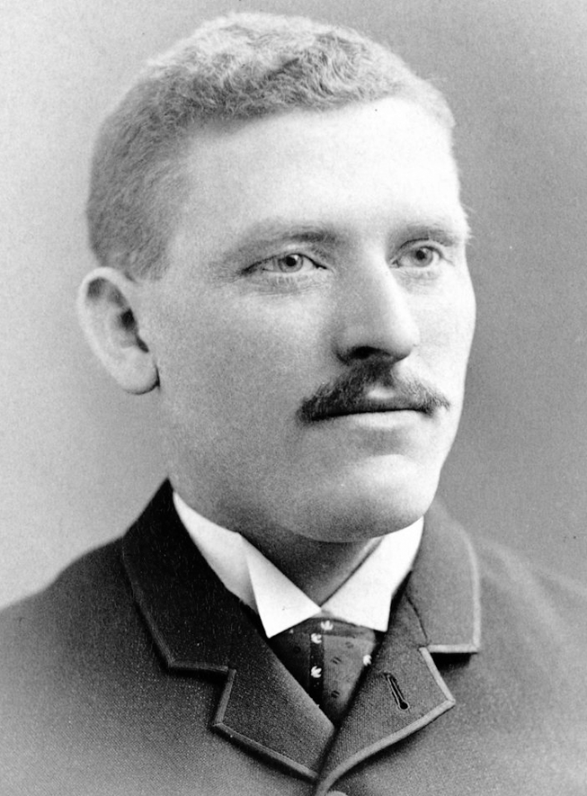 An archival photo of James Hart